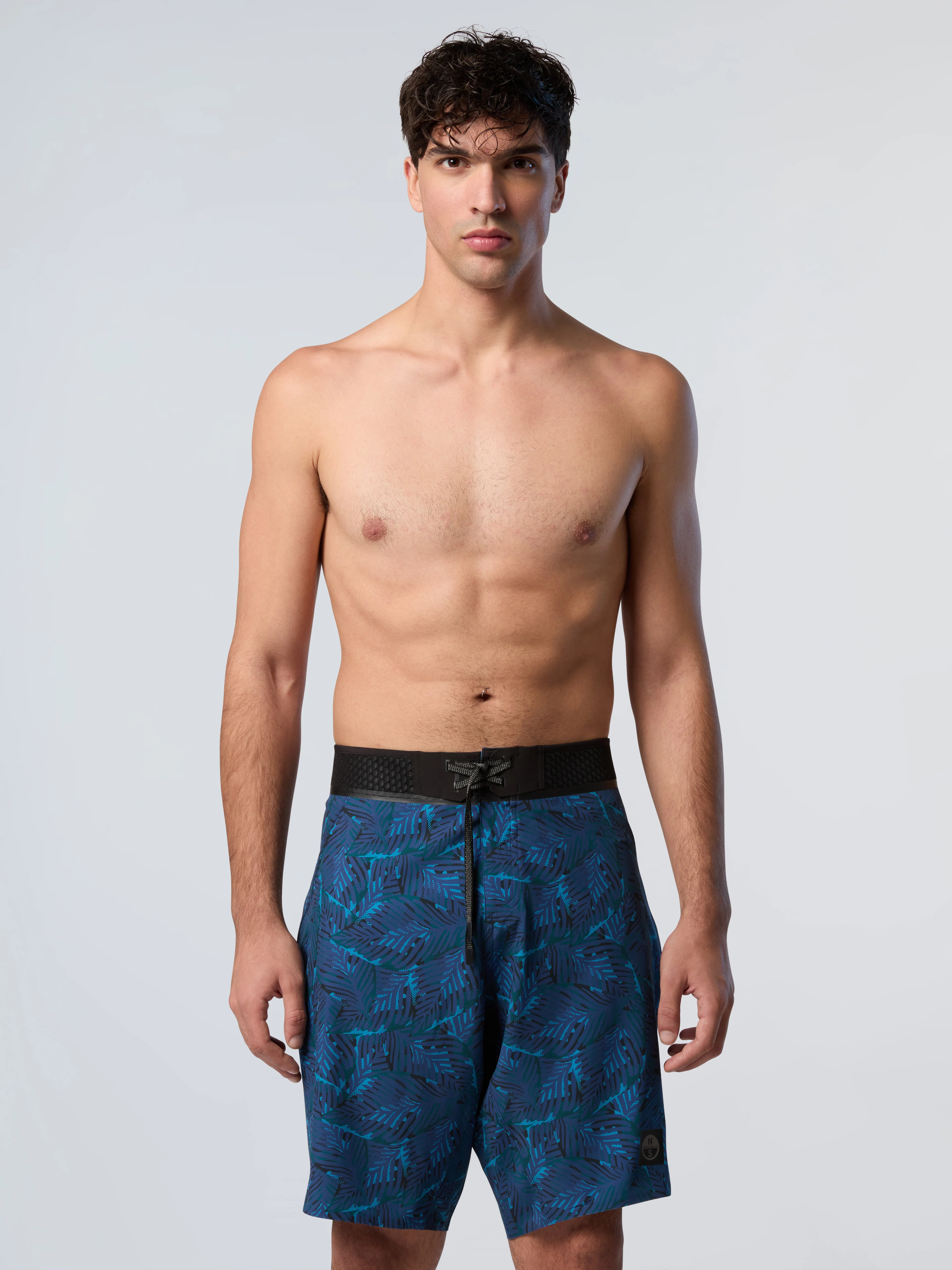 Board shorts with 3D motion waist